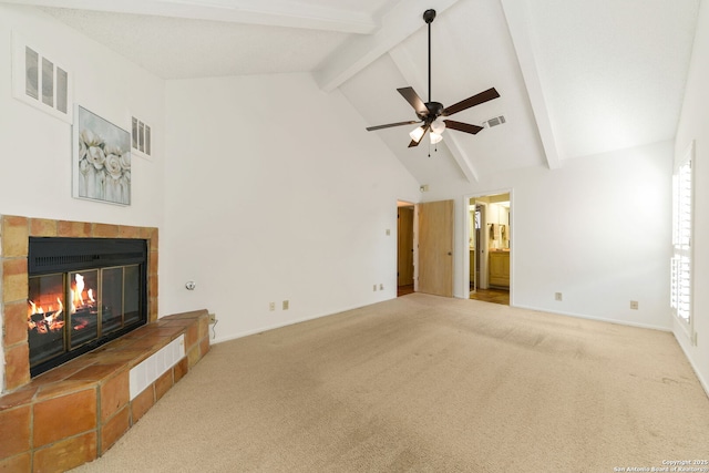 7519 Dijon Ct, San Antonio, TX 78209 - unfurnished living room featuring a tiled fireplace, carpet flooring, beamed ceiling, high vaulted ceiling, and baseboards