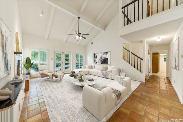 7519 Dijon Ct, San Antonio, TX 78209 - living area featuring high vaulted ceiling, ceiling fan, stairway, beam ceiling, and baseboards