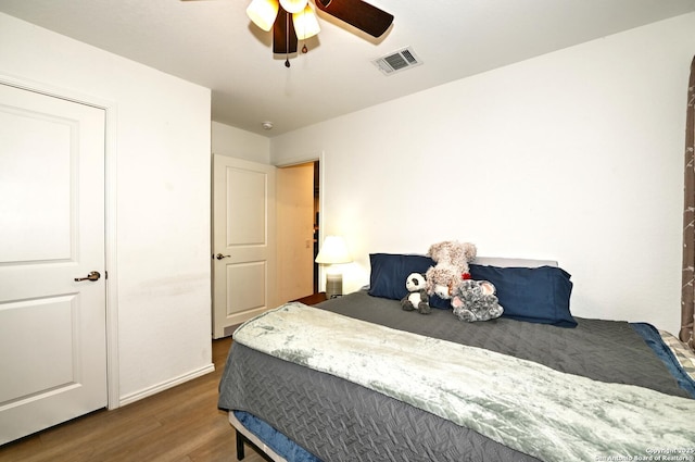 923 Cook Bnd, San Antonio, TX 78221 - bedroom with wood finished floors, ceiling fan, and baseboards