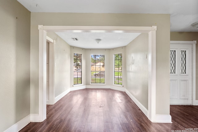 210 Daffodil St, Lake Jackson, TX 77566 - unfurnished room featuring wood finished floors and baseboards