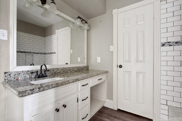 210 Daffodil St, Lake Jackson, TX 77566 - bathroom with wood finished floors and vanity