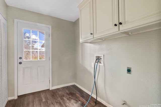 210 Daffodil St, Lake Jackson, TX 77566 - laundry room featuring electric dryer hookup, cabinet space, dark wood finished floors, washer hookup, and baseboards