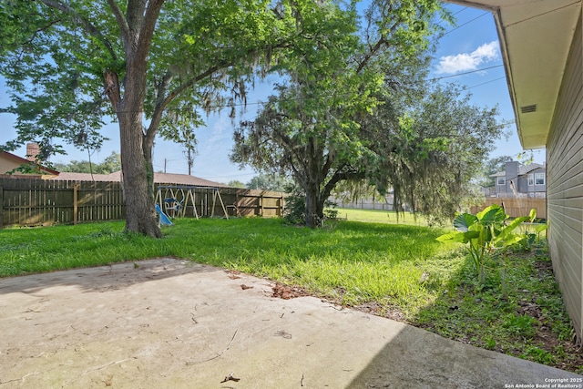 210 Daffodil St, Lake Jackson, TX 77566 - view of yard with a patio