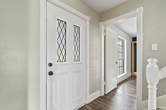 210 Daffodil St, Lake Jackson, TX 77566 - entrance foyer featuring baseboards and dark wood finished floors