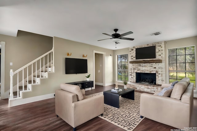210 Daffodil St, Lake Jackson, TX 77566 - living area with a ceiling fan, stairs, dark wood-style floors, and plenty of natural light