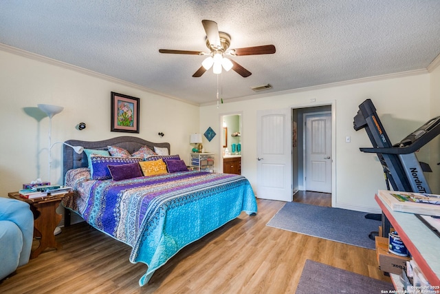9618 Alderwood, San Antonio, TX 78250 - bedroom featuring wood finished floors, ornamental molding, a textured ceiling, ceiling fan, and connected bathroom