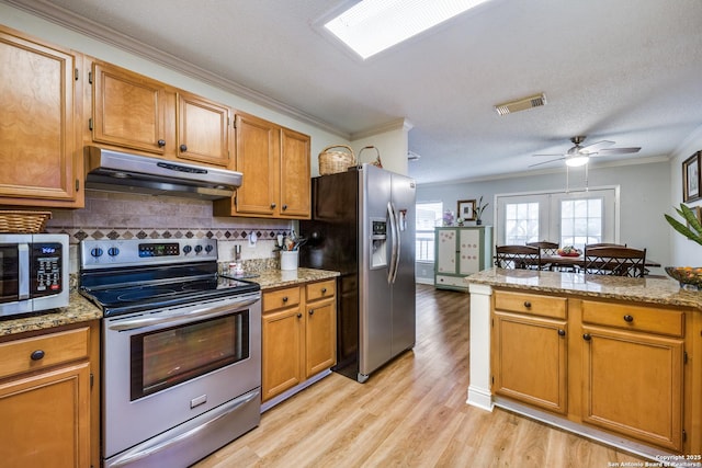 9618 Alderwood, San Antonio, TX 78250 - kitchen featuring stainless steel appliances, under cabinet range hood, ornamental molding, light wood-type flooring, and decorative backsplash
