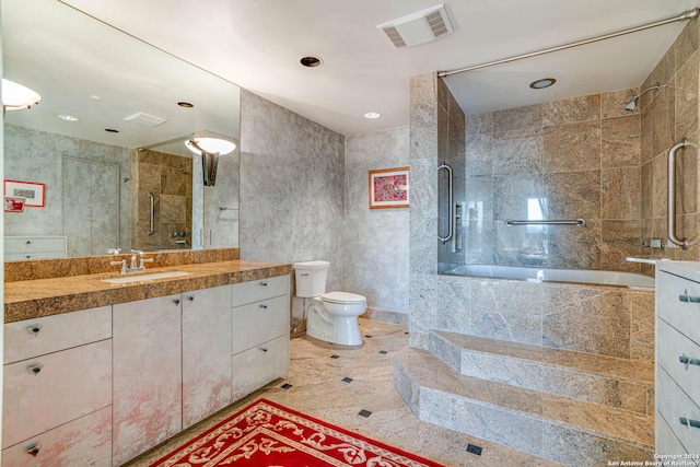 7887 Broadway Unit 1102, San Antonio, TX 78209 - bathroom with tiled shower, a bathtub, vanity, toilet, and recessed lighting