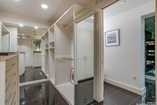 7887 Broadway Unit 1102, San Antonio, TX 78209 - spacious closet with dark tile patterned flooring