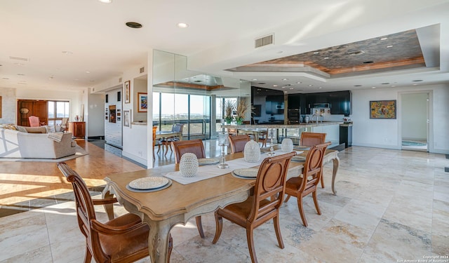 7887 Broadway Unit 1102, San Antonio, TX 78209 - dining room with baseboards, recessed lighting, and a raised ceiling