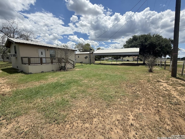 13338 Interstate 35, Moore, TX 78057 - view of green lawn featuring a carport