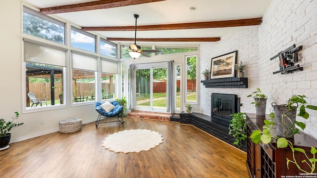 511 Serenade, San Antonio, TX 78216 - sunroom featuring healthy amount of natural light, wood finished floors, beam ceiling, and baseboards