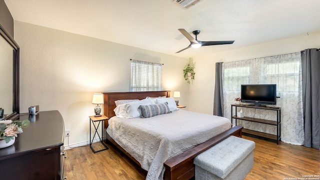 511 Serenade, San Antonio, TX 78216 - bedroom with wood finished floors, ceiling fan, and baseboards