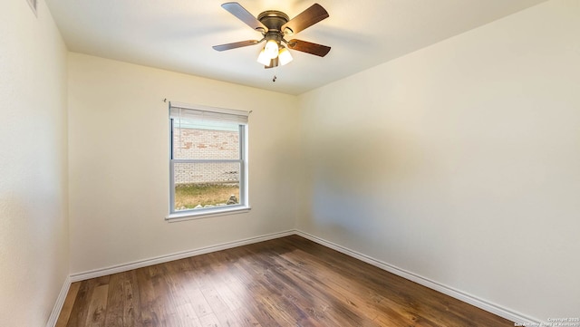 511 Serenade, San Antonio, TX 78216 - unfurnished room with baseboards, dark wood-type flooring, and ceiling fan
