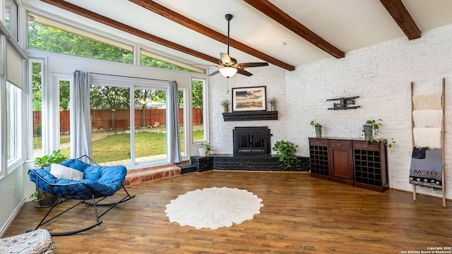 511 Serenade, San Antonio, TX 78216 - living area with a brick fireplace, ceiling fan, and wood finished floors