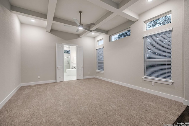 557 Poe Pkwy, Castroville, TX 78009 - unfurnished bedroom with beamed ceiling, recessed lighting, coffered ceiling, connected bathroom, and baseboards