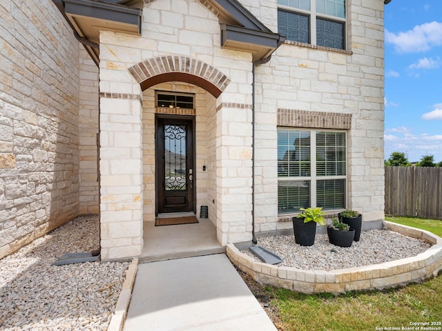 126 Stout Cv, Cibolo, TX 78108 - doorway to property with stone siding