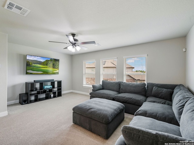 126 Stout Cv, Cibolo, TX 78108 - carpeted living room featuring baseboards, ceiling fan, and plenty of natural light