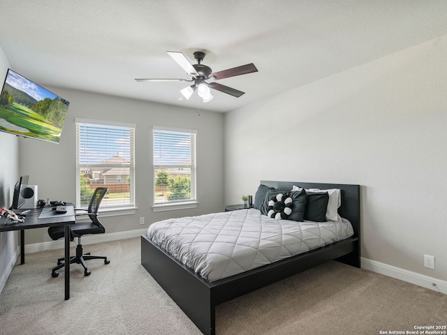 126 Stout Cv, Cibolo, TX 78108 - bedroom featuring carpet, an office area, baseboards, and a ceiling fan