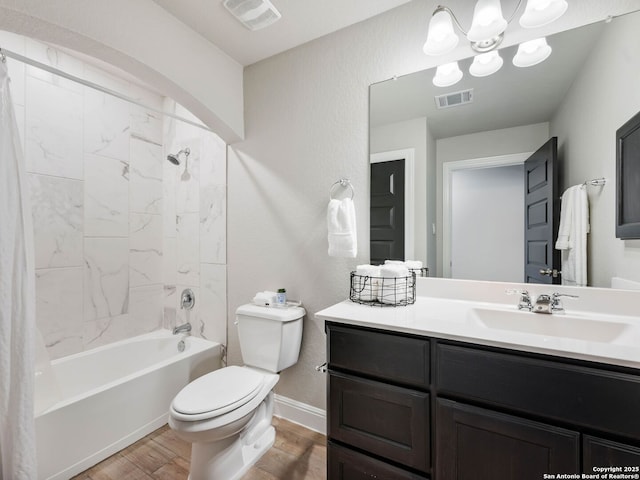 126 Stout Cv, Cibolo, TX 78108 - full bathroom featuring wood finished floors, toilet, shower / bathtub combination with curtain, vanity, and baseboards