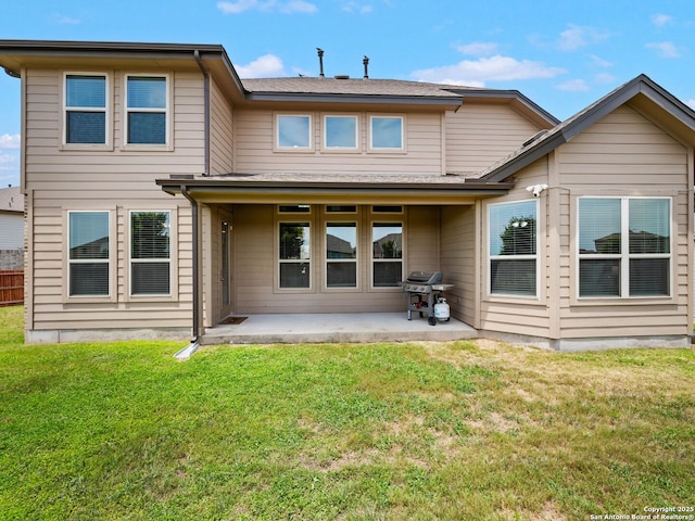 126 Stout Cv, Cibolo, TX 78108 - rear view of house with a patio and a lawn
