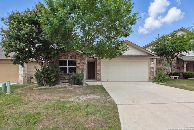 15206 Field Sparrow, San Antonio, TX 78253 - view of front facade featuring an attached garage, driveway, brick siding, and a front lawn