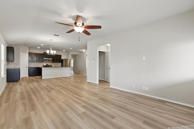 15206 Field Sparrow, San Antonio, TX 78253 - unfurnished living room with ceiling fan, recessed lighting, baseboards, and light wood-style floors