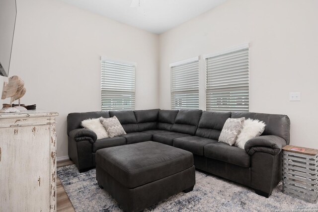 111 Great Chagos, Rockport, TX 78382 - living area featuring wood finished floors and ceiling fan
