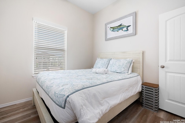 111 Great Chagos, Rockport, TX 78382 - bedroom with wood finished floors and baseboards