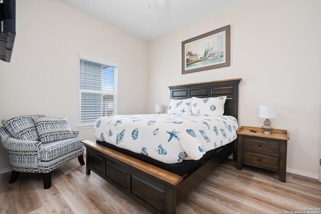 111 Great Chagos, Rockport, TX 78382 - bedroom featuring light wood-type flooring and baseboards