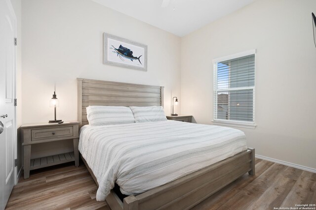 111 Great Chagos, Rockport, TX 78382 - bedroom with wood finished floors and baseboards