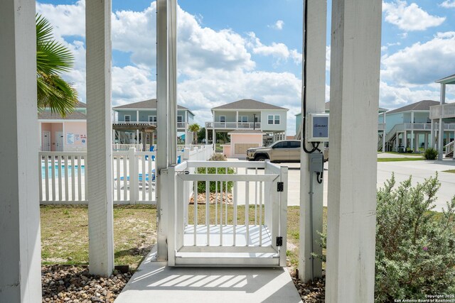 111 Great Chagos, Rockport, TX 78382 - doorway with a residential view and plenty of natural light