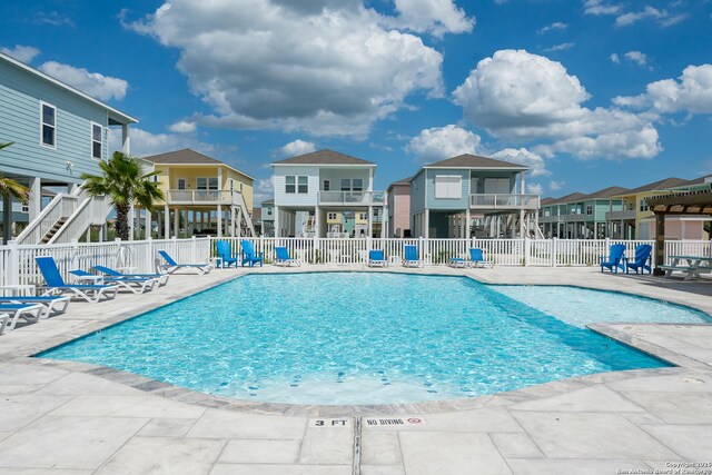 111 Great Chagos, Rockport, TX 78382 - community pool with a patio area and a residential view
