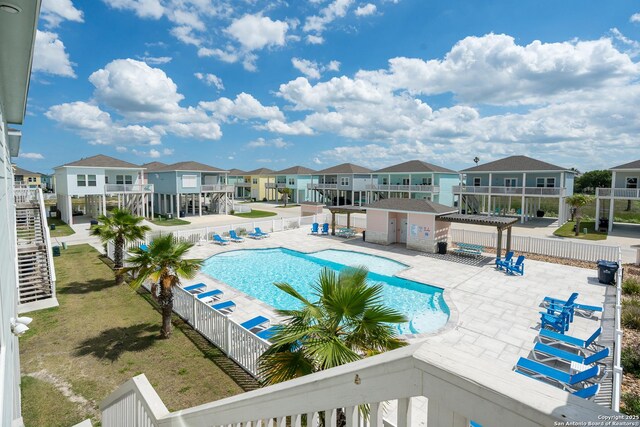111 Great Chagos, Rockport, TX 78382 - community pool featuring a residential view and a patio area