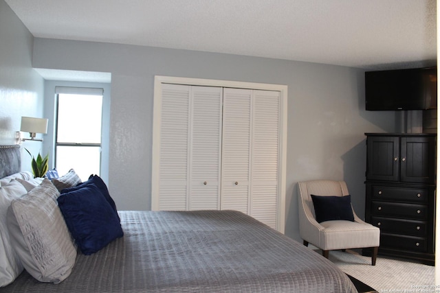104 Horseshoe Bay Unit 5, Horseshoe Bay, TX 78657 - bedroom with a closet and carpet floors