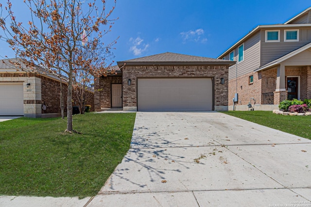 2733 Barkey Spg, San Antonio, TX 78245 - view of front of property with brick siding, an attached garage, a front yard, and driveway