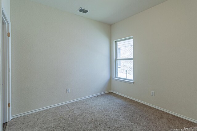 2733 Barkey Spg, San Antonio, TX 78245 - carpeted spare room with baseboards