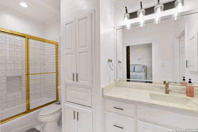 113 Carino Cv, Boerne, TX 78006 - full bathroom featuring shower / bath combination with glass door, toilet, vanity, ensuite bathroom, and crown molding