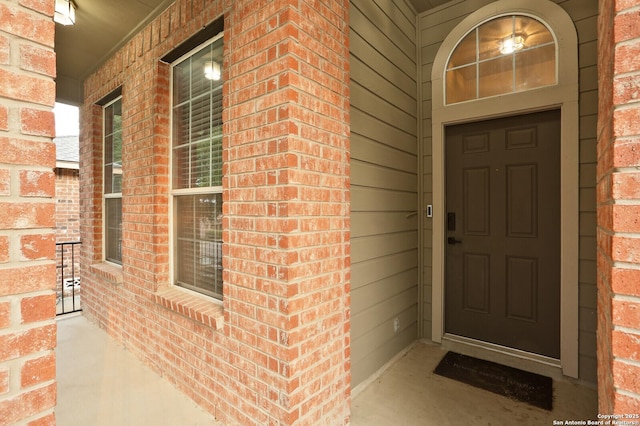 12234 Redbud Leaf, San Antonio, TX 78253 - entrance to property with brick siding and a porch