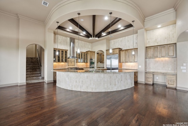 1078 Star Rdg, Spring Branch, TX 78070 - kitchen featuring stainless steel appliances, wall chimney range hood, a spacious island, dark wood finished floors, and decorative backsplash
