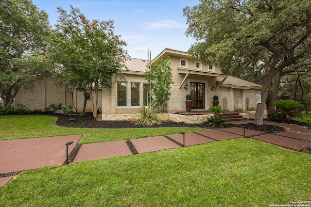 29729 Mellow Wind, Fair Oaks Ranch, TX 78015 - mid-century modern home featuring a front lawn, metal roof, stucco siding, and a standing seam roof