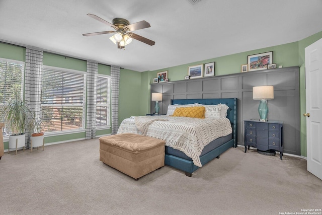7715 Beechnut Oak, San Antonio, TX 78223 - bedroom featuring carpet, ceiling fan, and baseboards