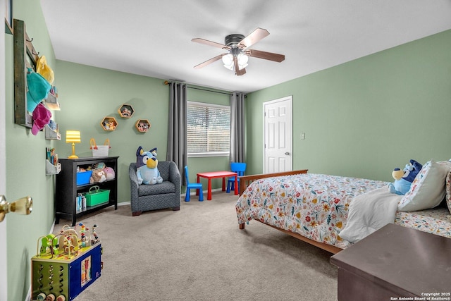 7715 Beechnut Oak, San Antonio, TX 78223 - carpeted bedroom with a ceiling fan and baseboards