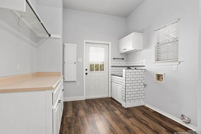 838 Georg Oaks, Bulverde, TX 78163 - laundry room with cabinet space, hookup for a washing machine, dark wood finished floors, and baseboards