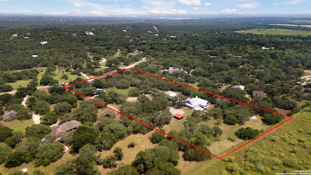 838 Georg Oaks, Bulverde, TX 78163 - aerial view of property and surrounding area featuring property boundaries highlighted and a heavily wooded area