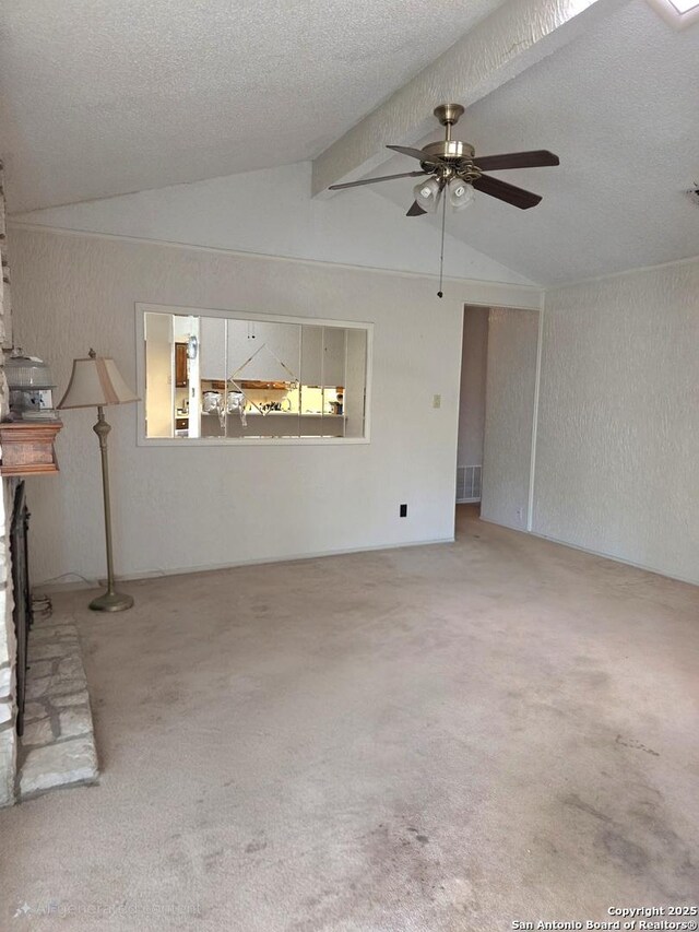 1319 Tideland, San Antonio, TX 78245 - unfurnished living room featuring a ceiling fan, carpet flooring, and a textured ceiling
