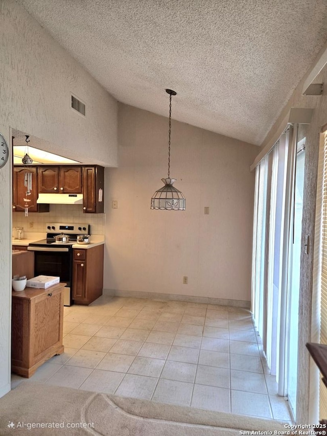 1319 Tideland, San Antonio, TX 78245 - kitchen featuring stainless steel range with electric cooktop, a textured ceiling, light tile patterned floors, light countertops, and under cabinet range hood