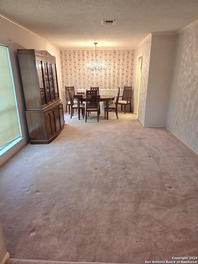 1319 Tideland, San Antonio, TX 78245 - dining room with a chandelier, crown molding, carpet floors, a textured ceiling, and wallpapered walls