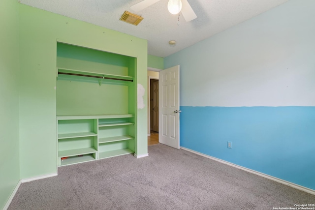 15527 Legend Spgs, San Antonio, TX 78247 - unfurnished bedroom with carpet floors, a closet, baseboards, and ceiling fan
