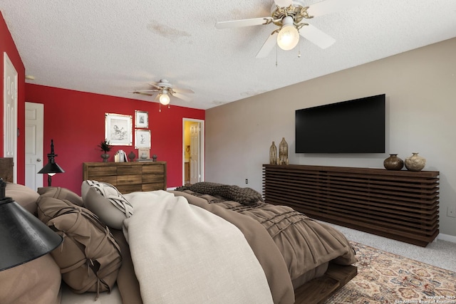15527 Legend Spgs, San Antonio, TX 78247 - carpeted bedroom with a textured ceiling and a ceiling fan